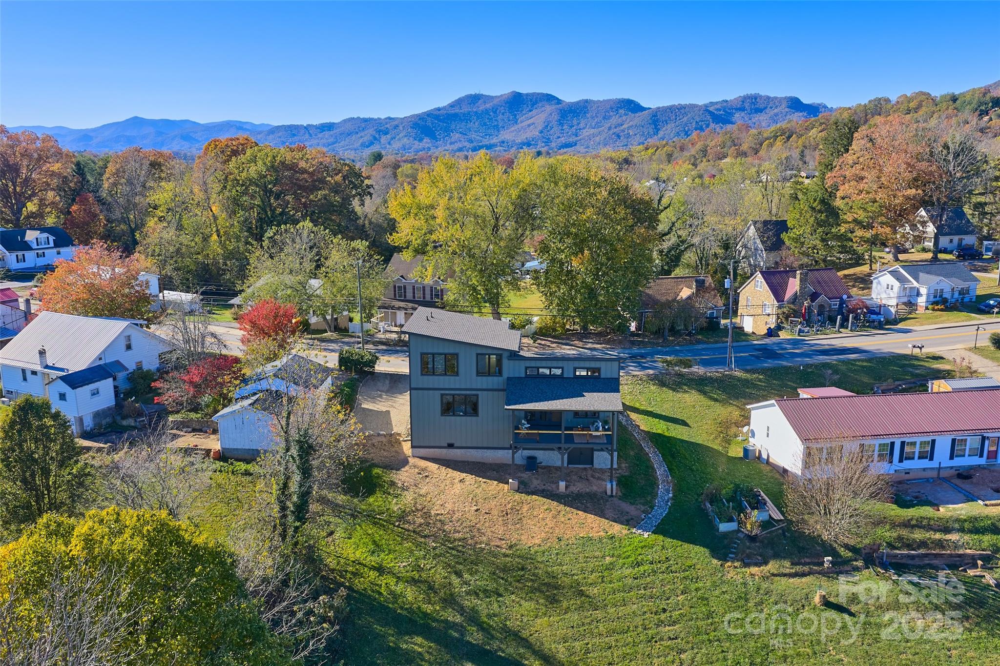 872 Newfound Road Canton, NC 28716 - Photo 37 of 44 an aerial view of a house with a yard