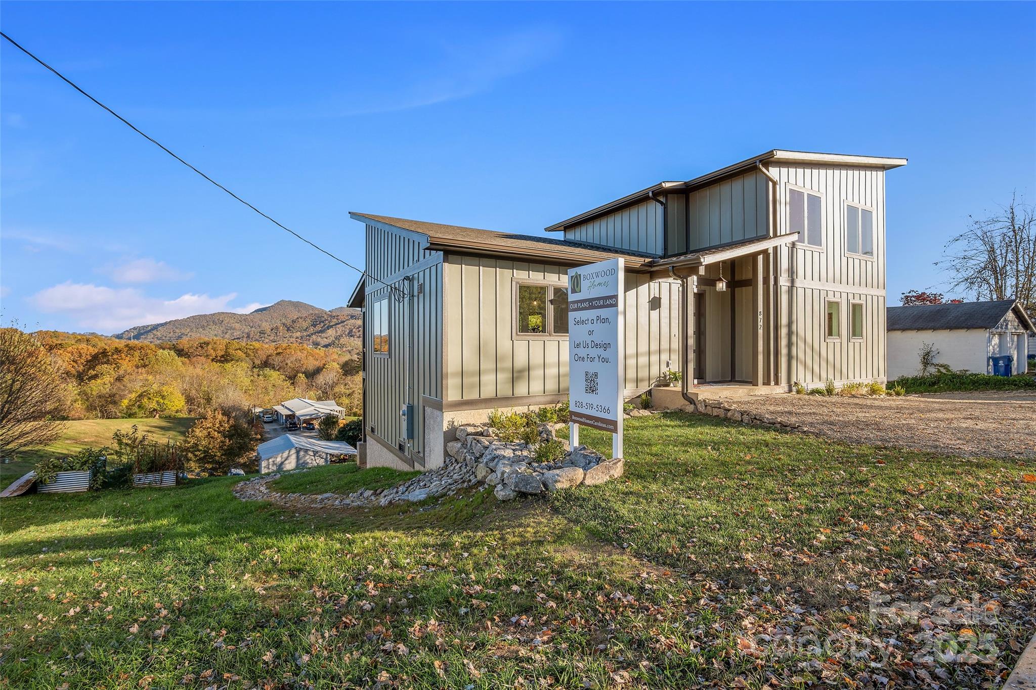 872 Newfound Road Canton, NC 28716 - Photo 41 of 44 a backyard of a house with lots of green space