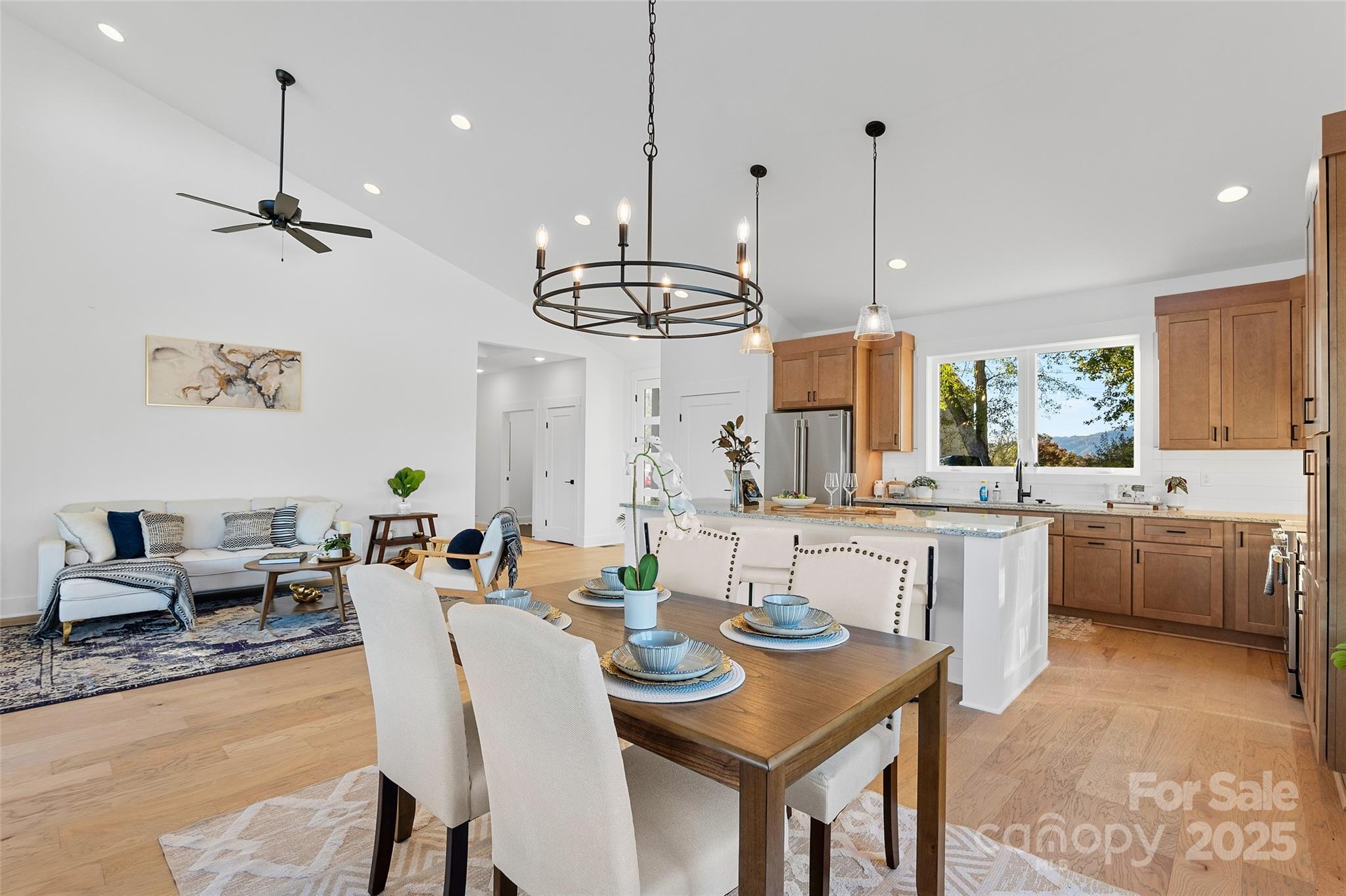 872 Newfound Road Canton, NC 28716 - Photo 7 of 44 a view of a dining room with furniture window and wooden floor