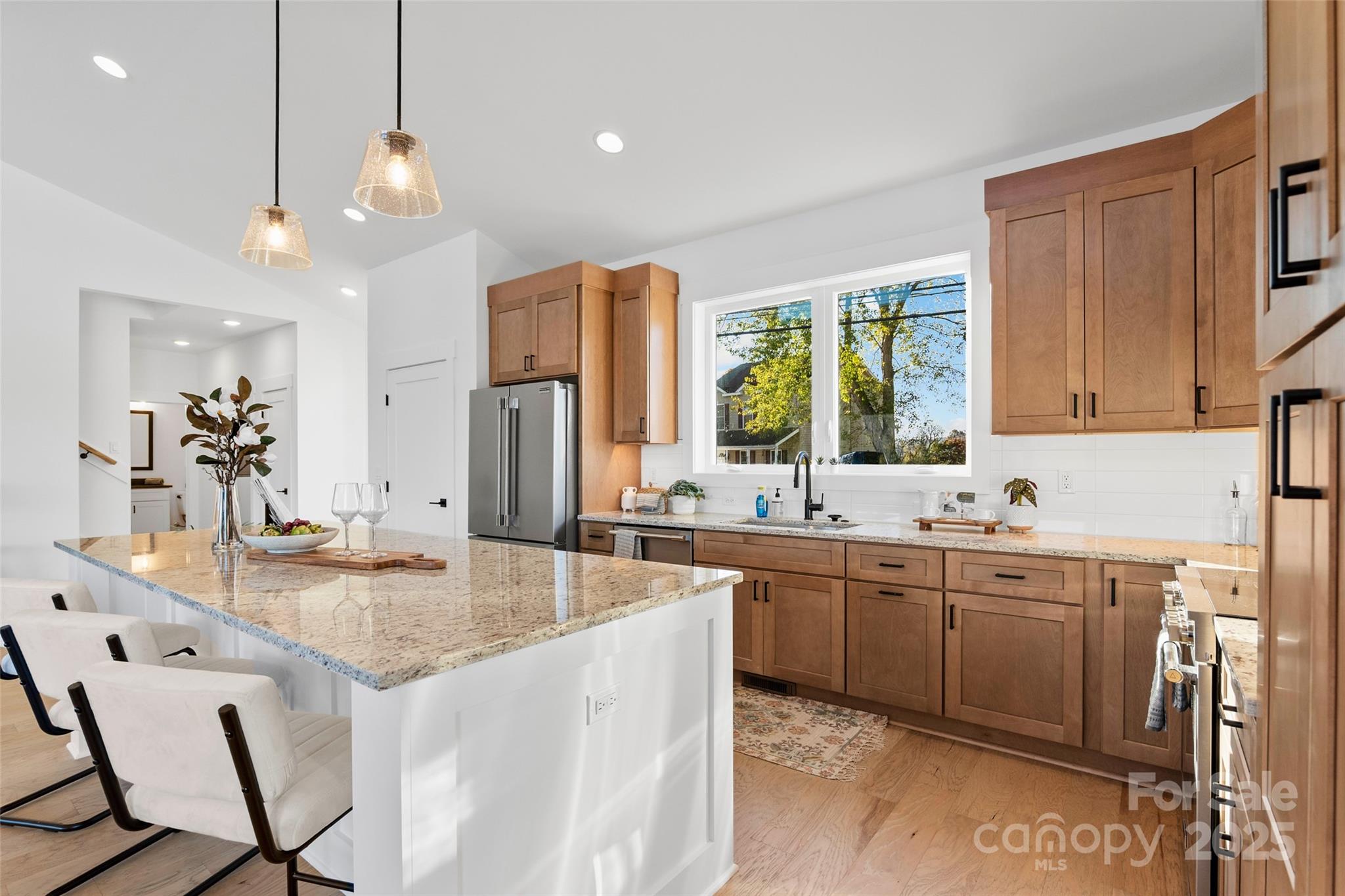 872 Newfound Road Canton, NC 28716 - Photo 8 of 44 a kitchen with center island and stainless steel appliances
