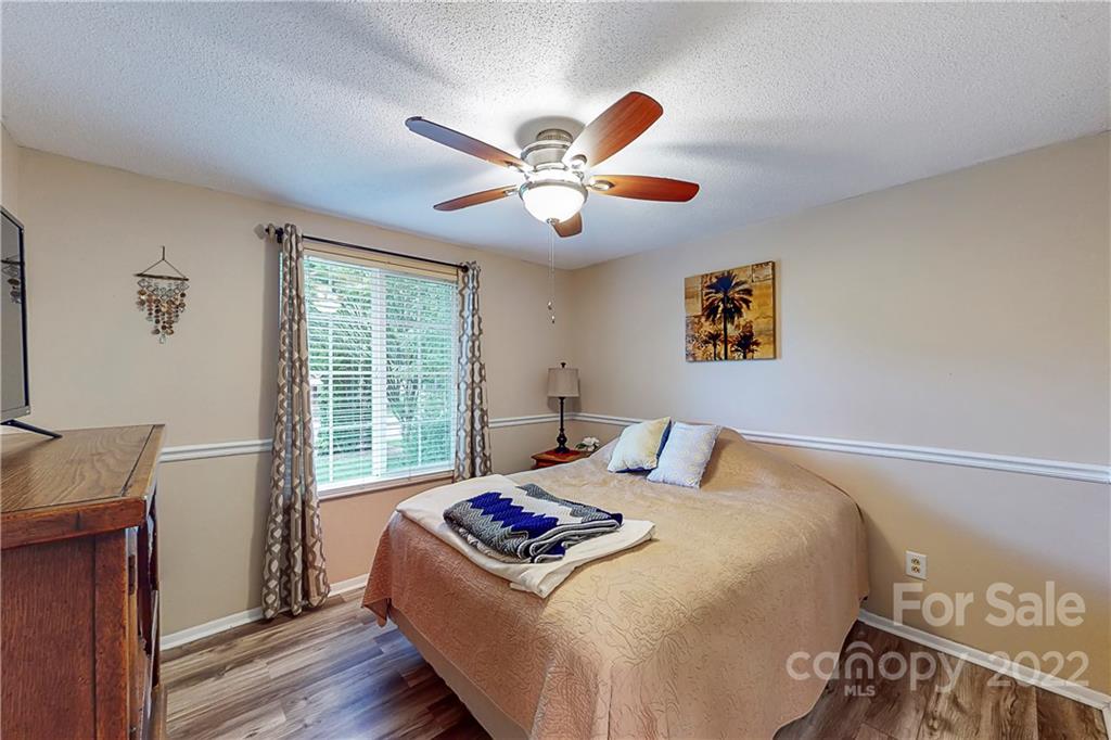 12118 Mapleton Road Charlotte, NC 28273 - Photo 15 of 48 a bedroom with a bed and a window