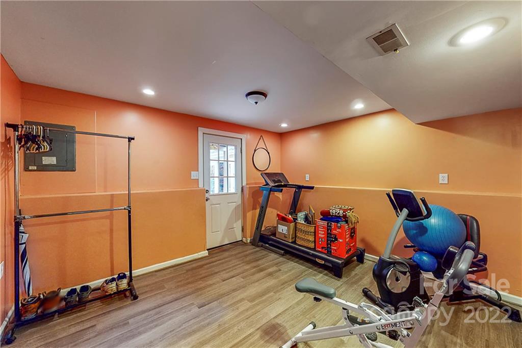 12118 Mapleton Road Charlotte, NC 28273 - Photo 28 of 48 a children room with wooden floor