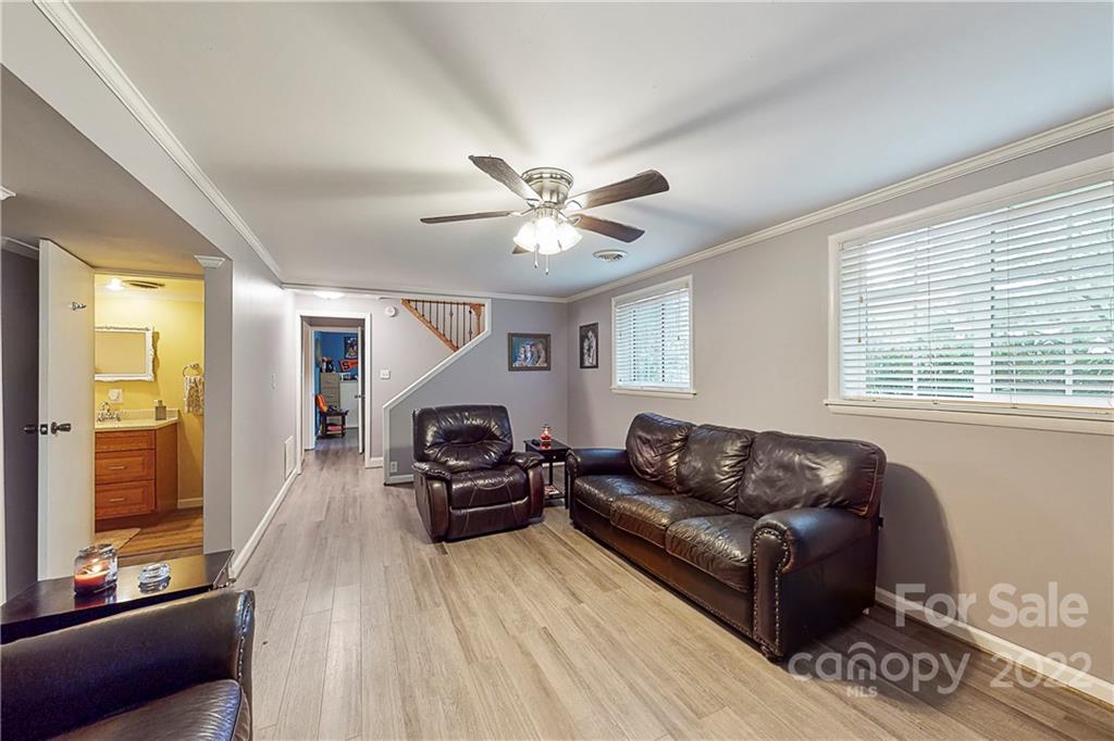 12118 Mapleton Road Charlotte, NC 28273 - Photo 29 of 48 a living room with furniture and a large window