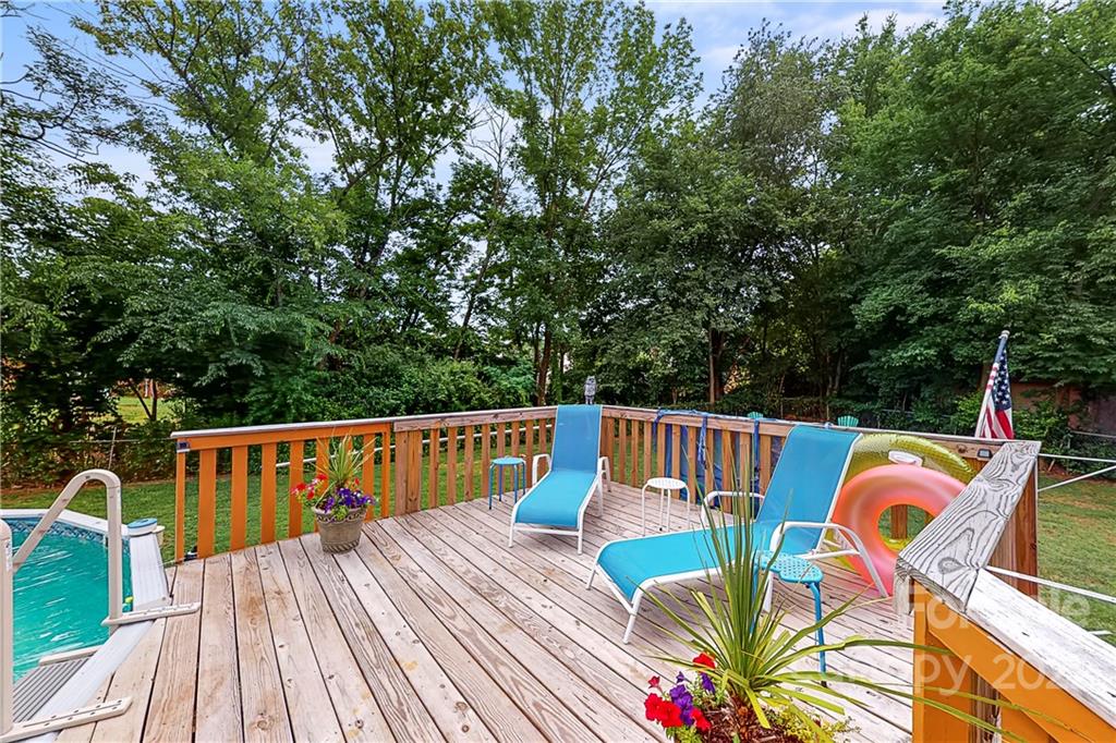 12118 Mapleton Road Charlotte, NC 28273 - Photo 39 of 48 a view of deck with chairs and wooden floor