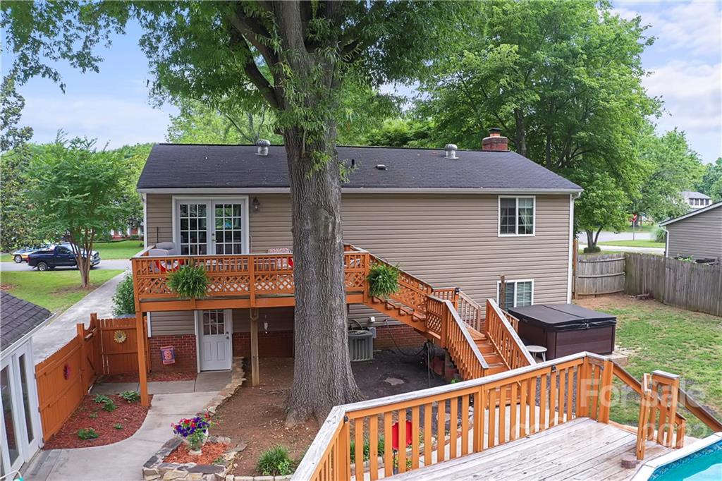 12118 Mapleton Road Charlotte, NC 28273 - Photo 46 of 48 a view of house with a chairs in a patio