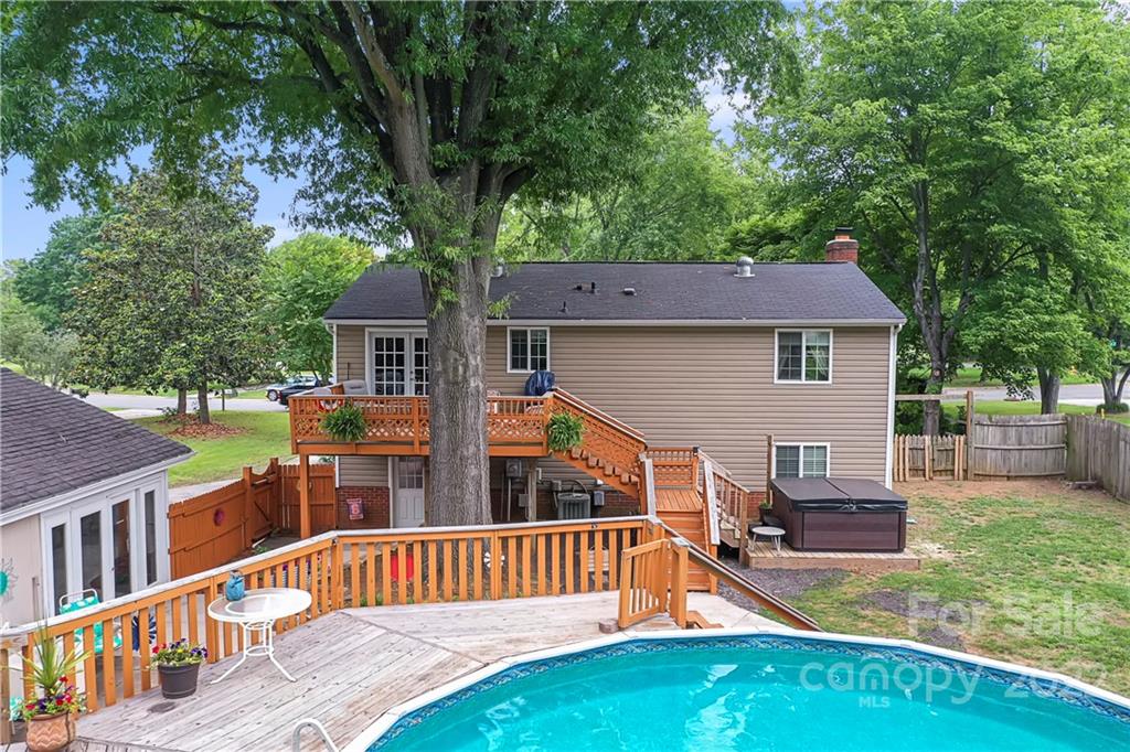 12118 Mapleton Road Charlotte, NC 28273 - Photo 47 of 48 a view of a house with a deck and a yard