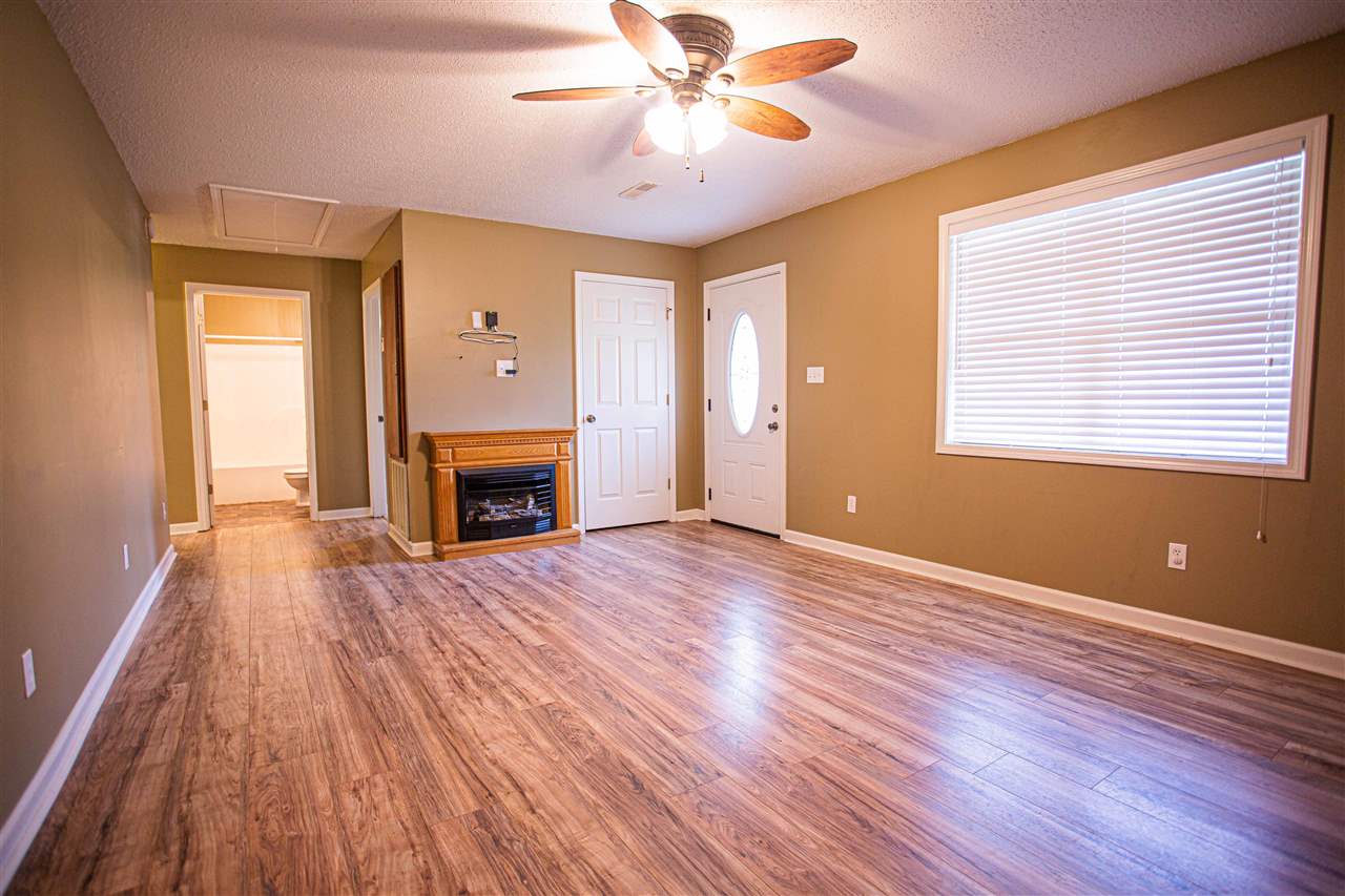 WOOD FLOORING.      FIREPLACE WITH VENTLESS GAS LOGS.