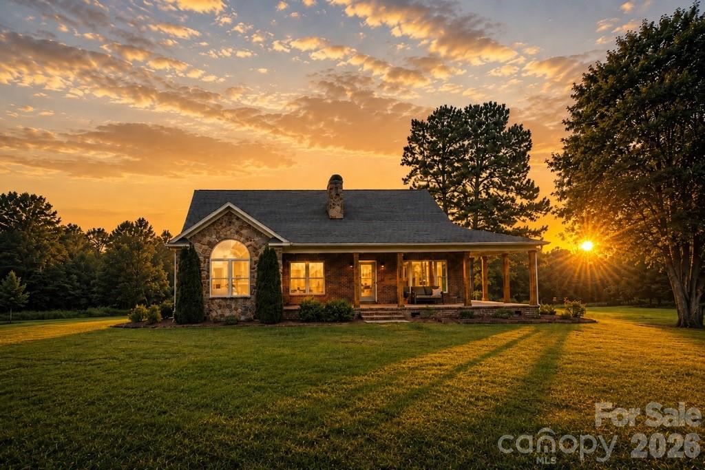 4445 Rowell Road Lancaster, SC 29720 - Photo 35 of 37 a front view of a house with a yard
