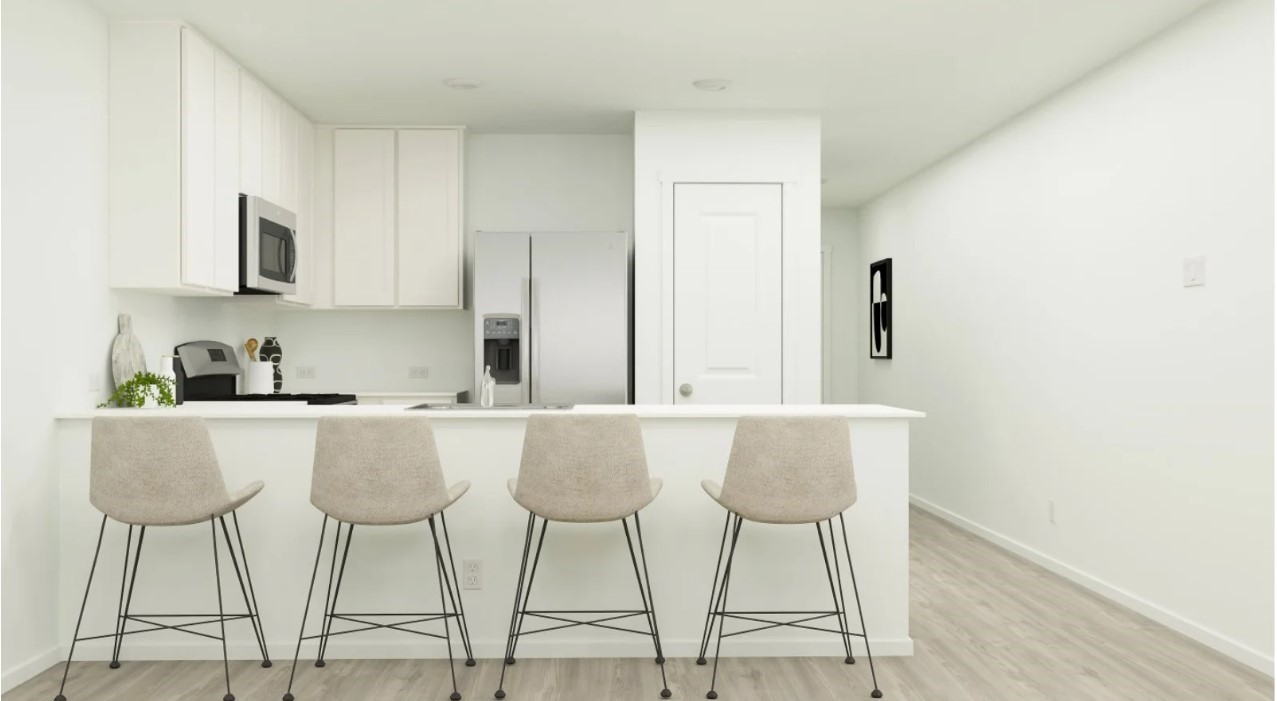 2403 Cherry Ruby Drive Rosharon, TX 77583 - Photo 11 of 30 a kitchen with stainless steel appliances a dining table chairs and a refrigerator a sink