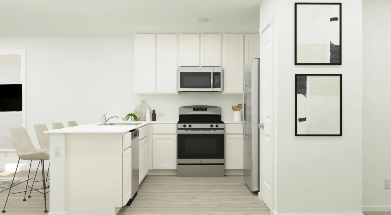 2403 Cherry Ruby Drive Rosharon, TX 77583 - Photo 12 of 30 a kitchen with stainless steel appliances a stove microwave and sink