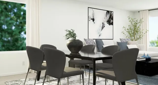 a view of a livingroom with furniture