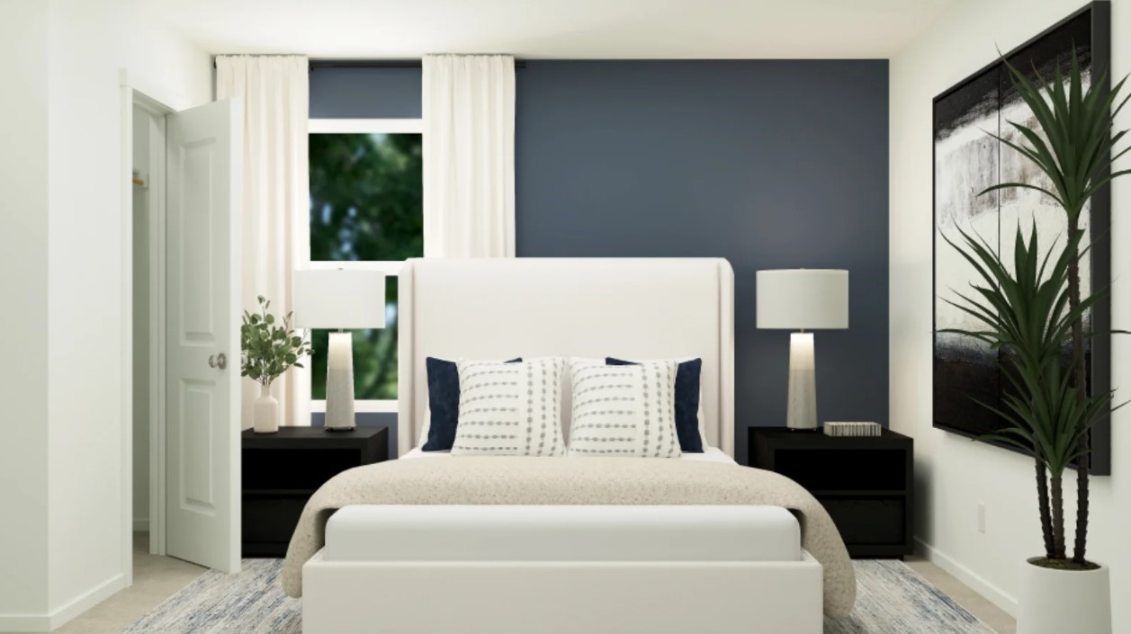 2403 Cherry Ruby Drive Rosharon, TX 77583 - Photo 18 of 30 a bedroom with a bed table flowerpot and a window