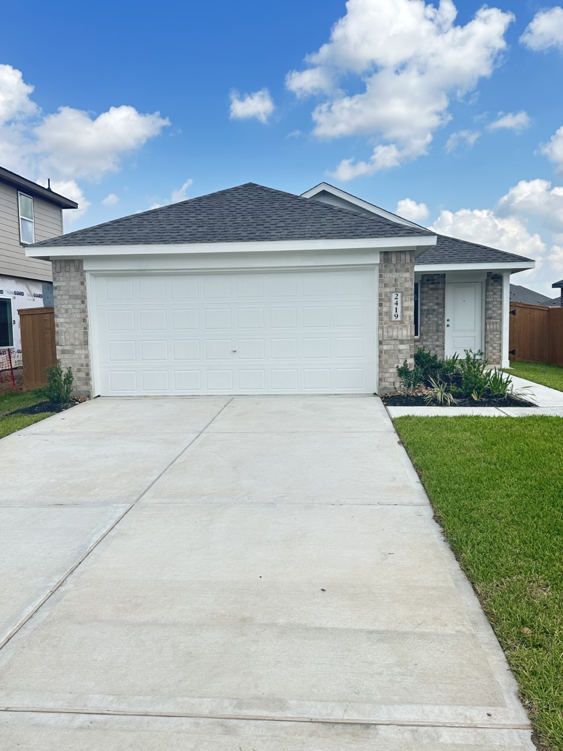 2403 Cherry Ruby Drive Rosharon, TX 77583 - Photo 2 of 30 front view of house with a yard