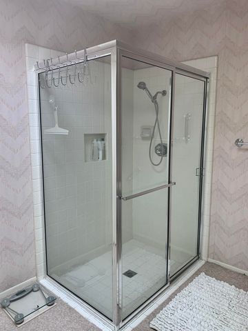 a bedroom with a bed and a cabinets