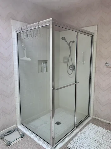 a bedroom with a bed and a cabinets