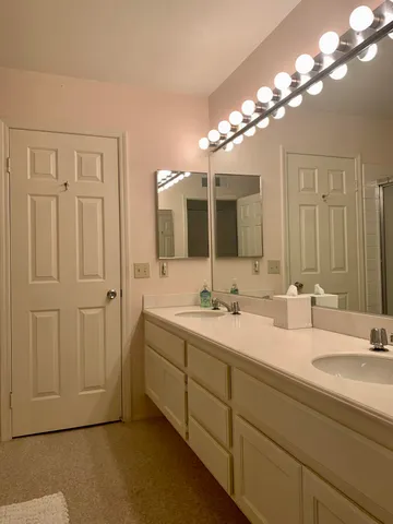 a bathroom with a shower and a toilet