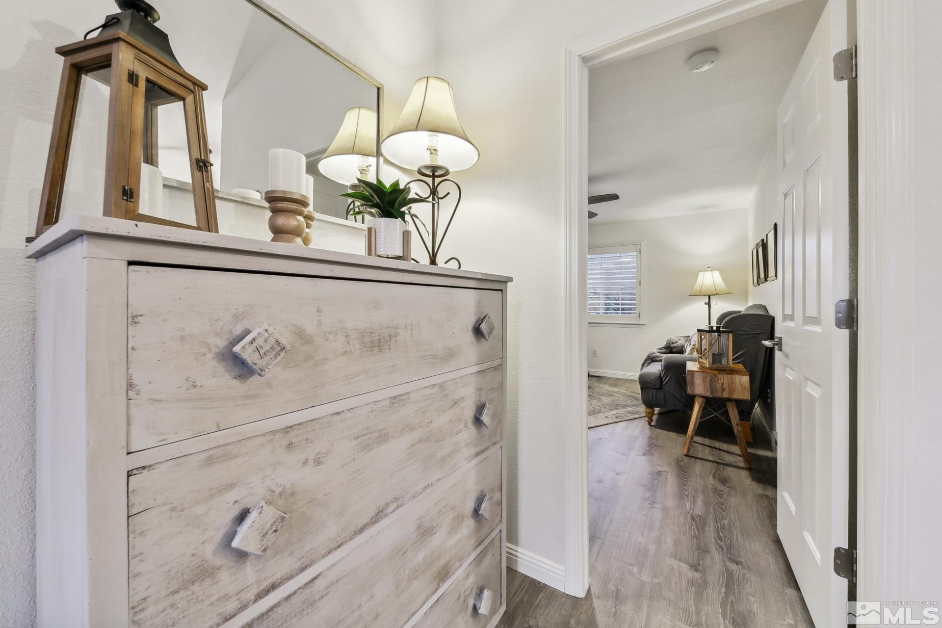 10 Conner Way Gardnerville, NV 89410 - Photo 29 of 40 a view of a dining room with furniture and wooden floor