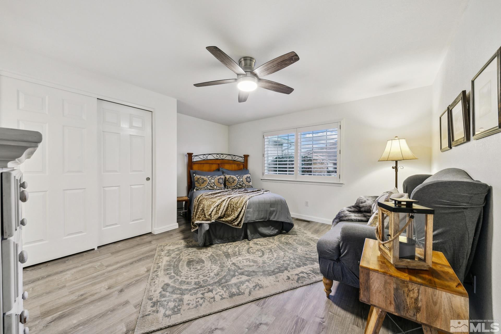 10 Conner Way Gardnerville, NV 89410 - Photo 30 of 40 a bedroom with furniture and wooden floor