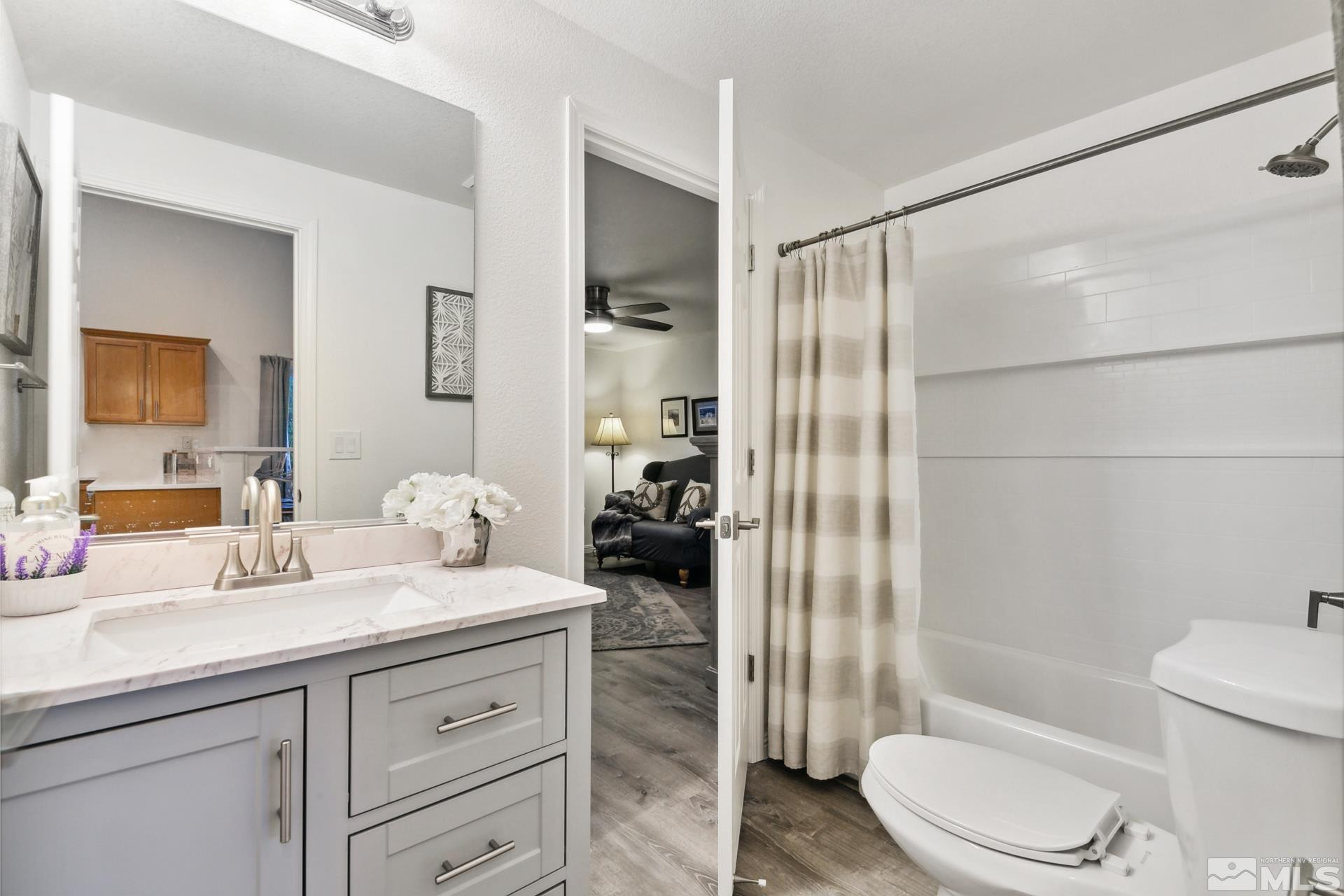 10 Conner Way Gardnerville, NV 89410 - Photo 33 of 40 a bathroom with a sink a toilet and shower