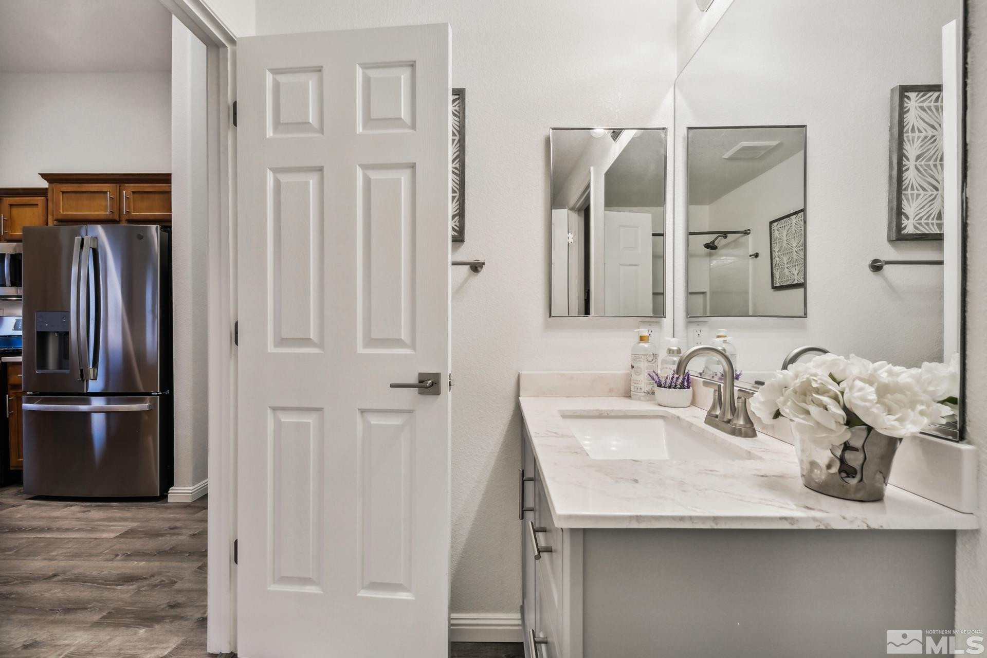 10 Conner Way Gardnerville, NV 89410 - Photo 34 of 40 a bathroom with a sink and a mirror