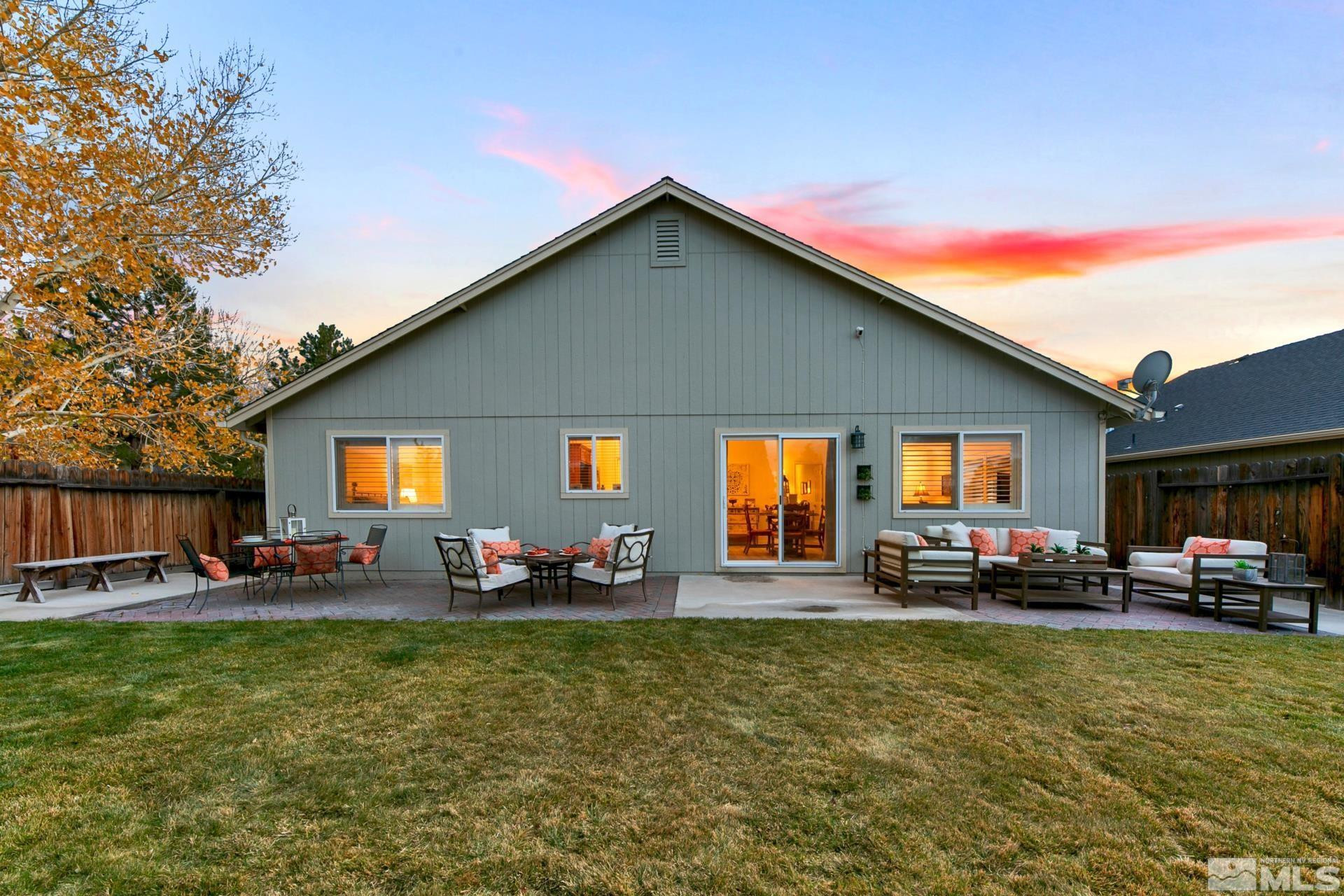 10 Conner Way Gardnerville, NV 89410 - Photo 8 of 40 a living room with furniture and a flat screen tv