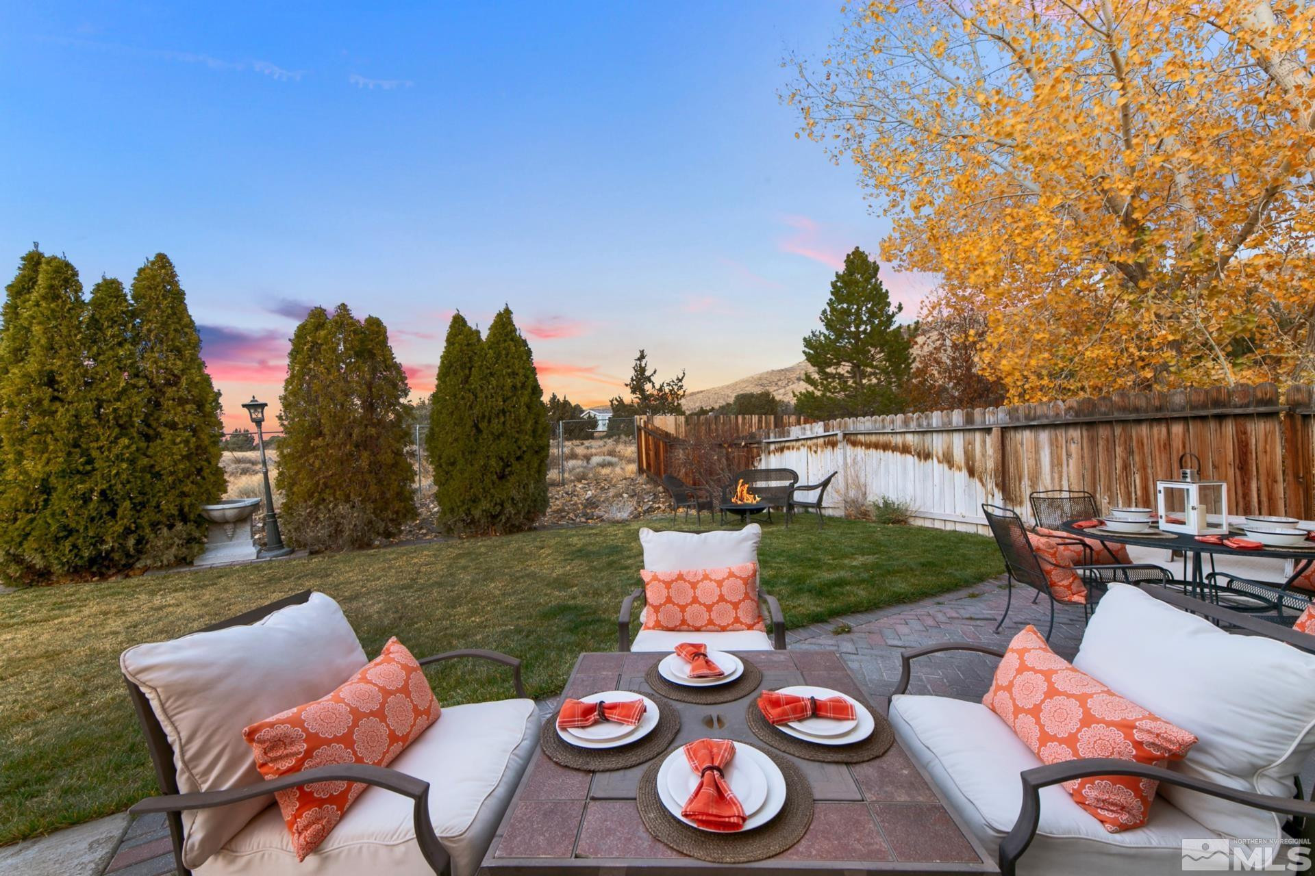 10 Conner Way Gardnerville, NV 89410 - Photo 10 of 40 a view of a chairs and table in patio