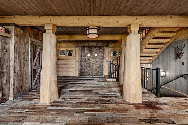 a kitchen with stainless steel appliances granite countertop a sink and cabinets