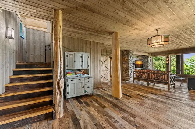 a view of a city with lush green forest