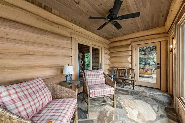 a view of a city with lush green forest