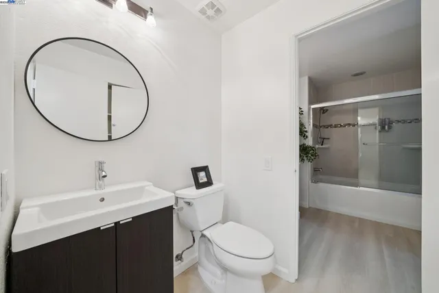 a outdoor living space with furniture and a potted plant