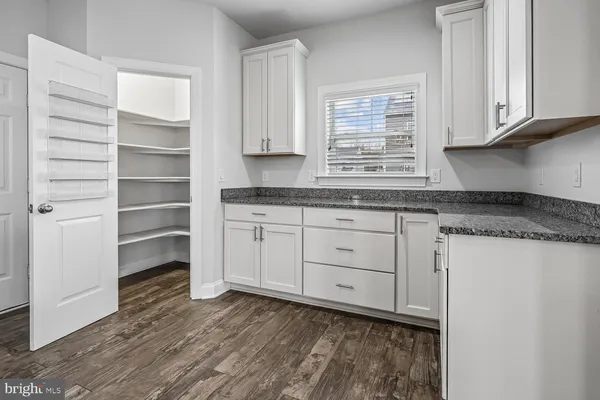 a view of an empty walk in closet