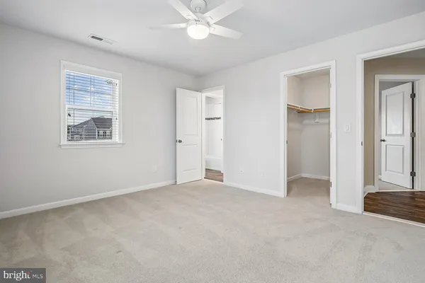 a view of a backyard of the house