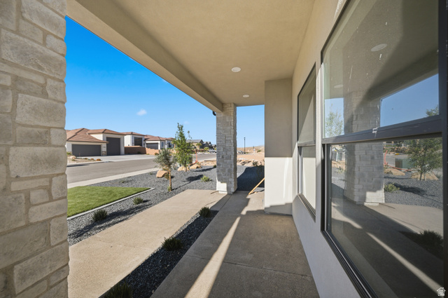 3011 East Rimrunner Drive, Unit 302 St. George, UT 84790 - Photo 7 of 45 Porch featuring a residential view