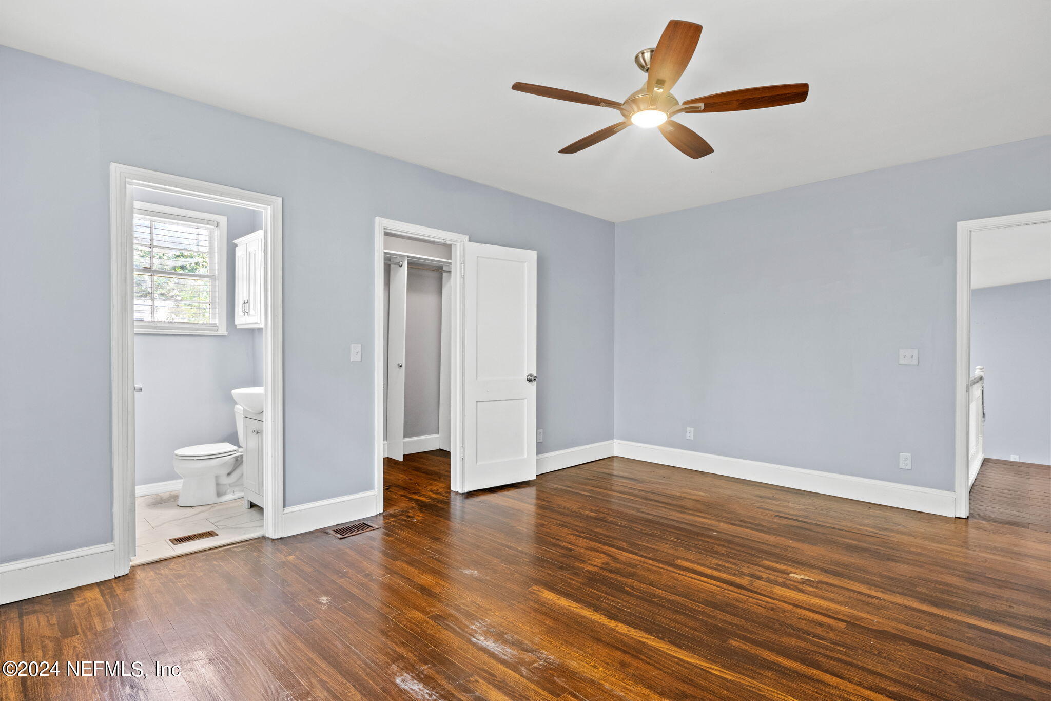 746 Hamilton Street Jacksonville, FL 32205 - Photo 20 of 28 wooden floor in an empty room with a window