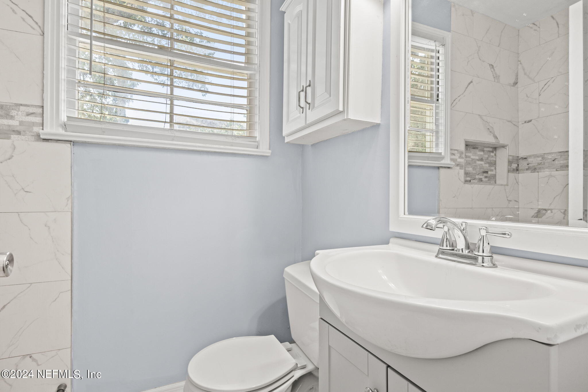 746 Hamilton Street Jacksonville, FL 32205 - Photo 8 of 28 a bathroom with a sink and a toilet