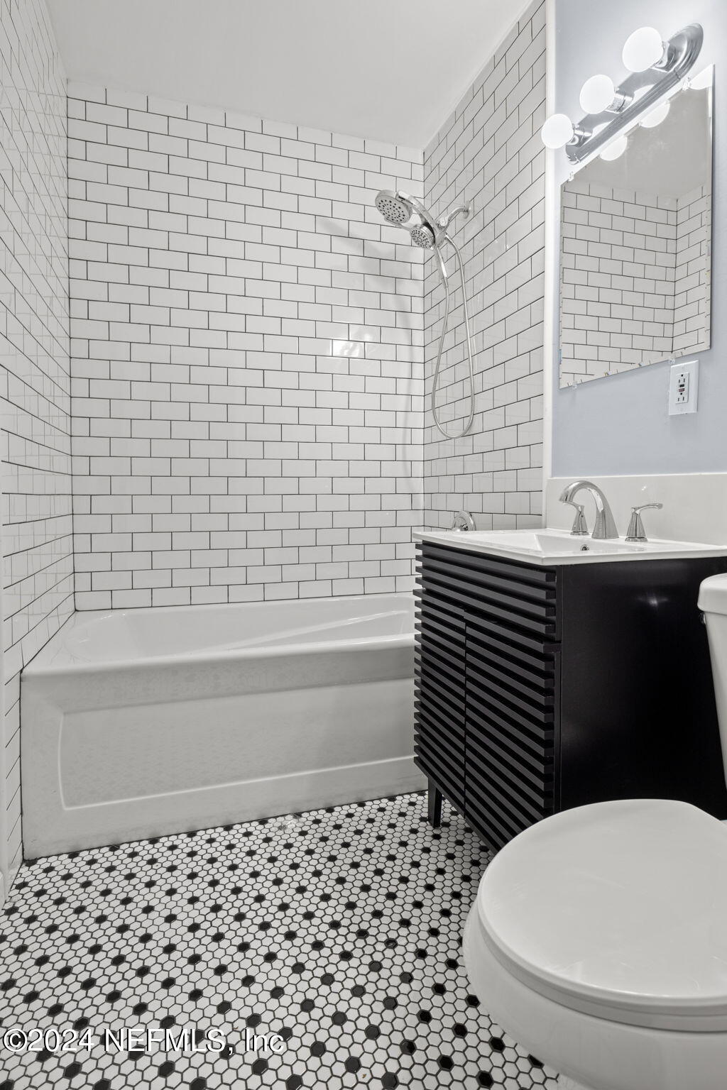746 Hamilton Street Jacksonville, FL 32205 - Photo 9 of 28 a bathroom with a sink a toilet and shower