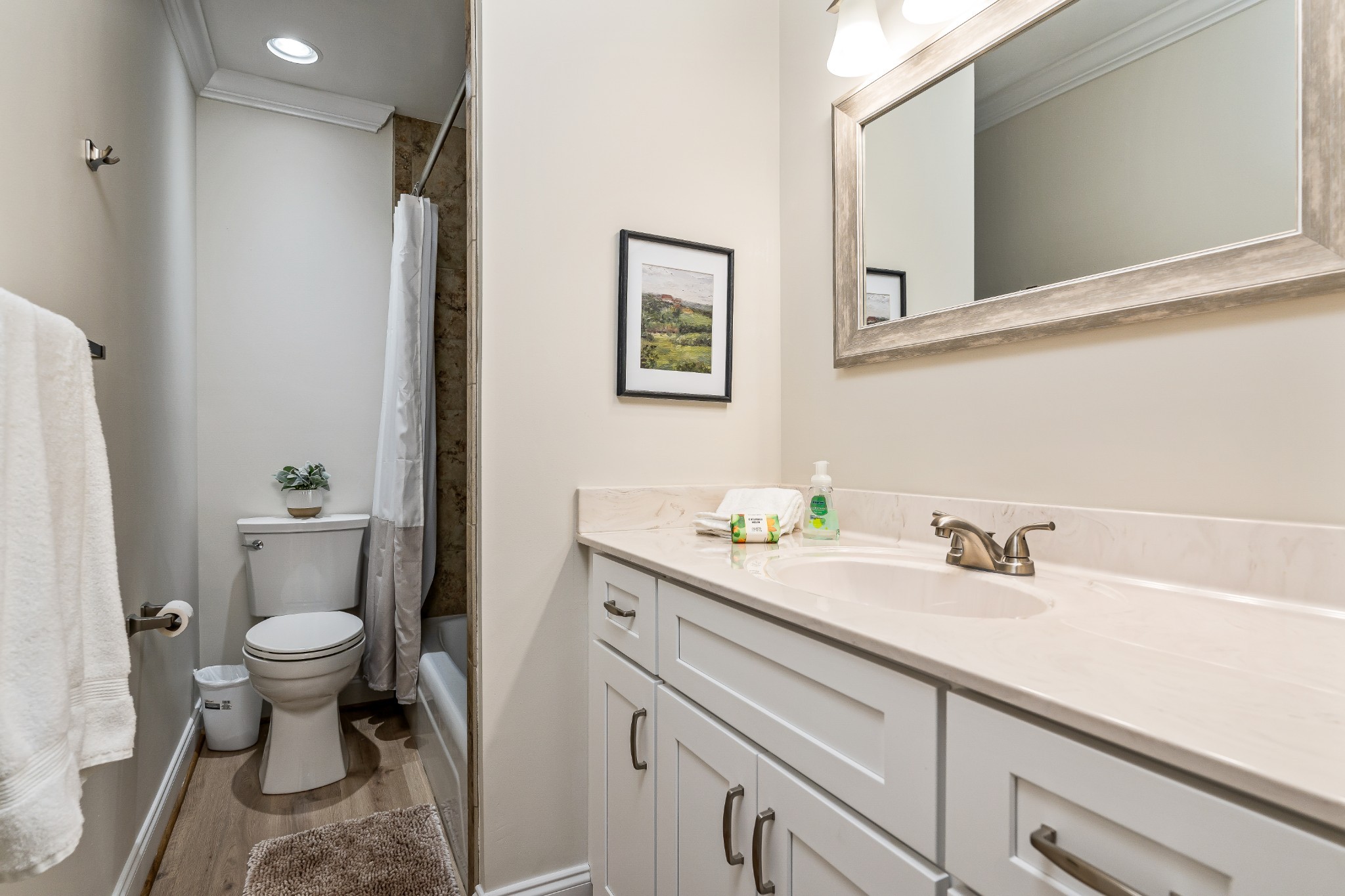1010 Country Club Road, Unit N3 Cookeville, TN 38501 - Photo 20 of 23 a bathroom with a sink a toilet and a mirror