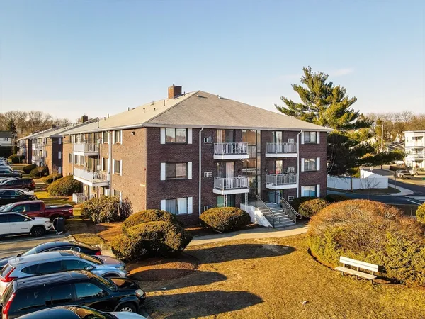 a view of a swimming pool with a lounge chairs