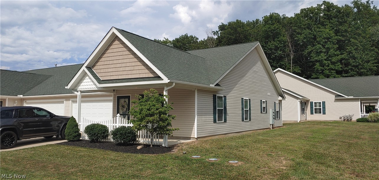 2903 Lake Road West Ashtabula, OH 44004 - Photo 1 of 14 End unit provides additional privacy