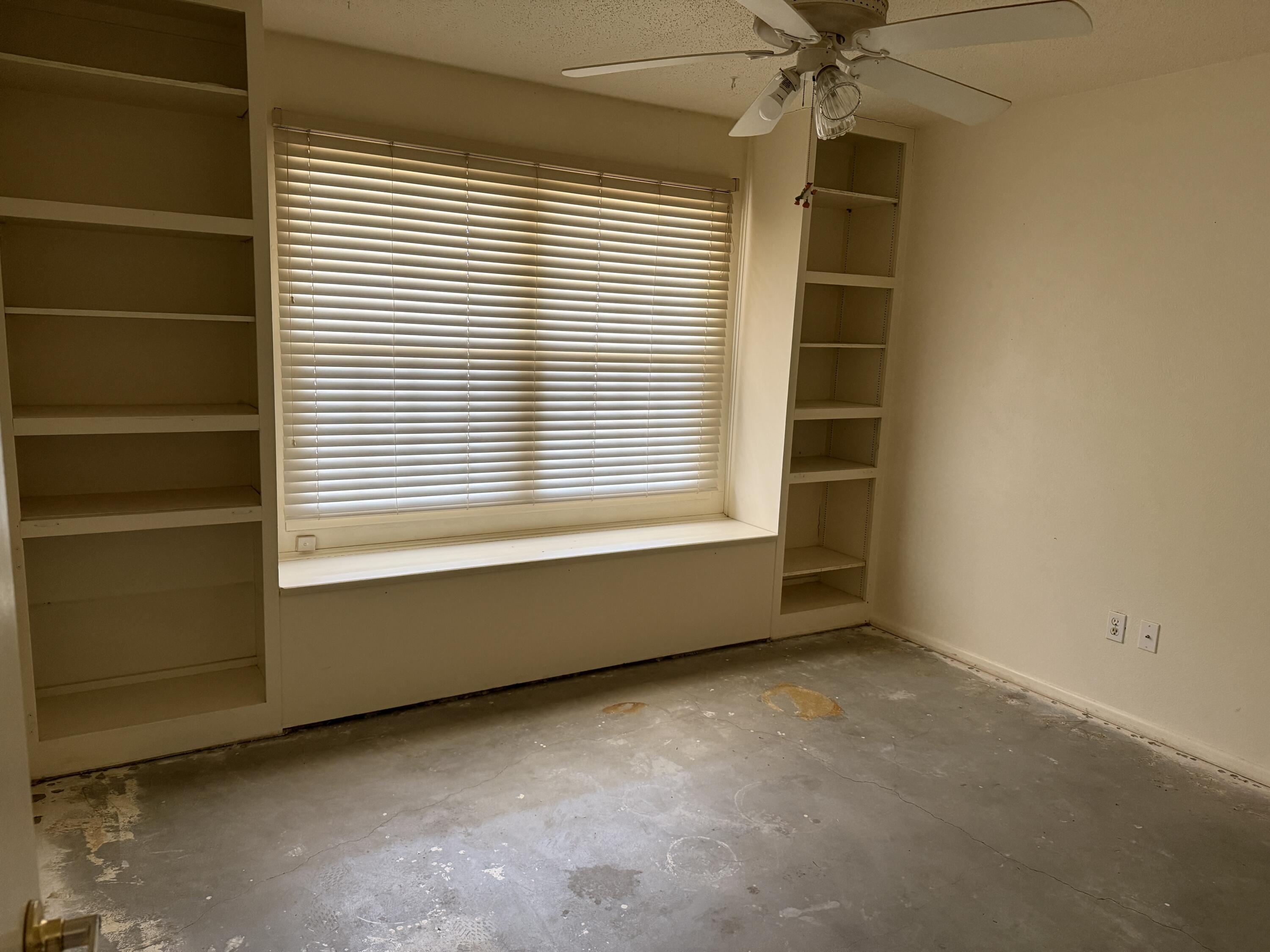 4418 58th Street Lubbock, TX 79414 - Photo 6 of 11 a view of an empty room with a window