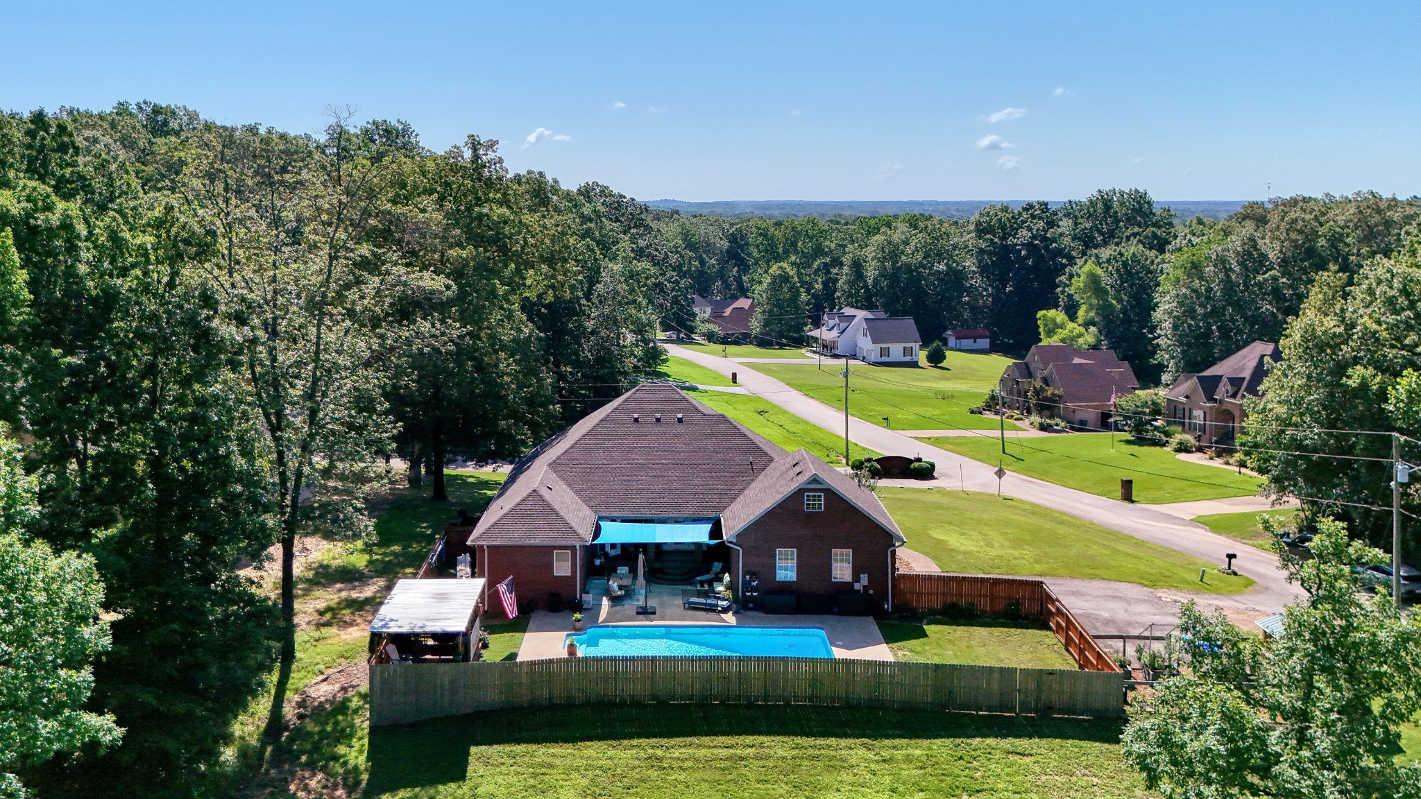 382 Timber Lane Huntingdon, TN 38344 - Photo 11 of 32 a view of house with swimming pool and yard