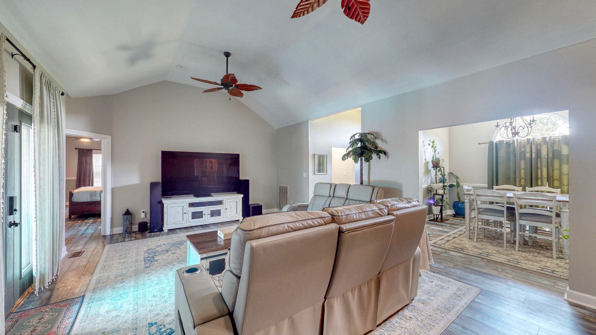 382 Timber Lane Huntingdon, TN 38344 - Photo 17 of 32 a living room with furniture a flat screen tv and a fireplace