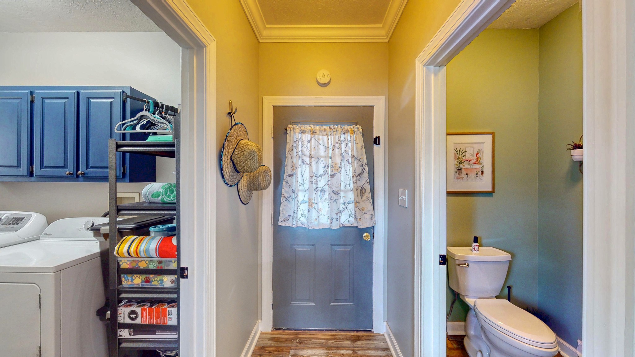 382 Timber Lane Huntingdon, TN 38344 - Photo 22 of 32 a bathroom with a toilet and a shower curtain