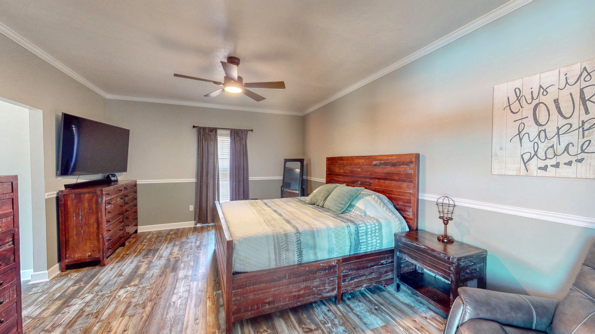 382 Timber Lane Huntingdon, TN 38344 - Photo 23 of 32 a bedroom with a bed and a television