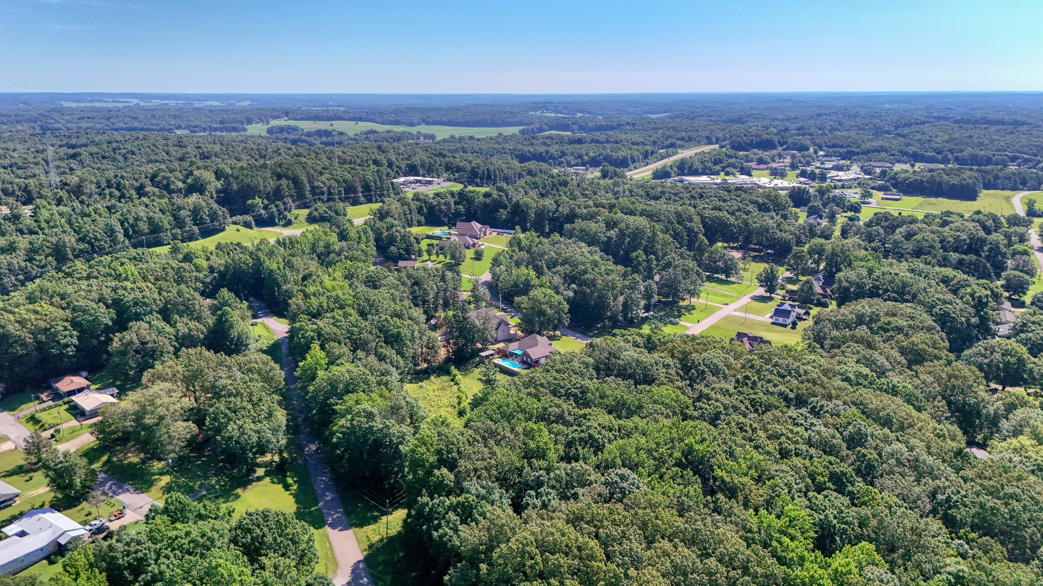382 Timber Lane Huntingdon, TN 38344 - Photo 3 of 32 an aerial view of a houses with a yard and lake view