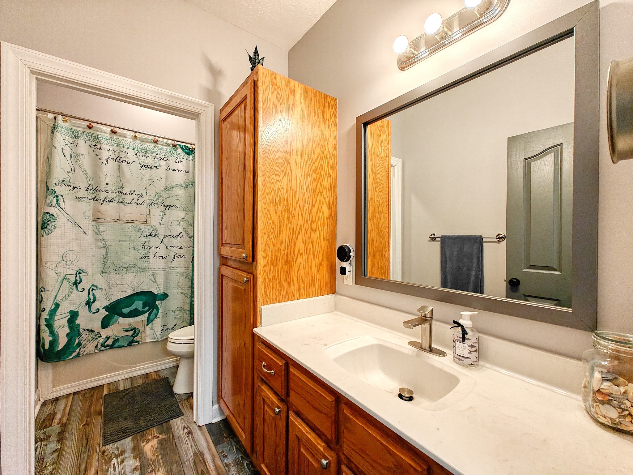 382 Timber Lane Huntingdon, TN 38344 - Photo 32 of 32 a bathroom with a double vanity sink and a mirror