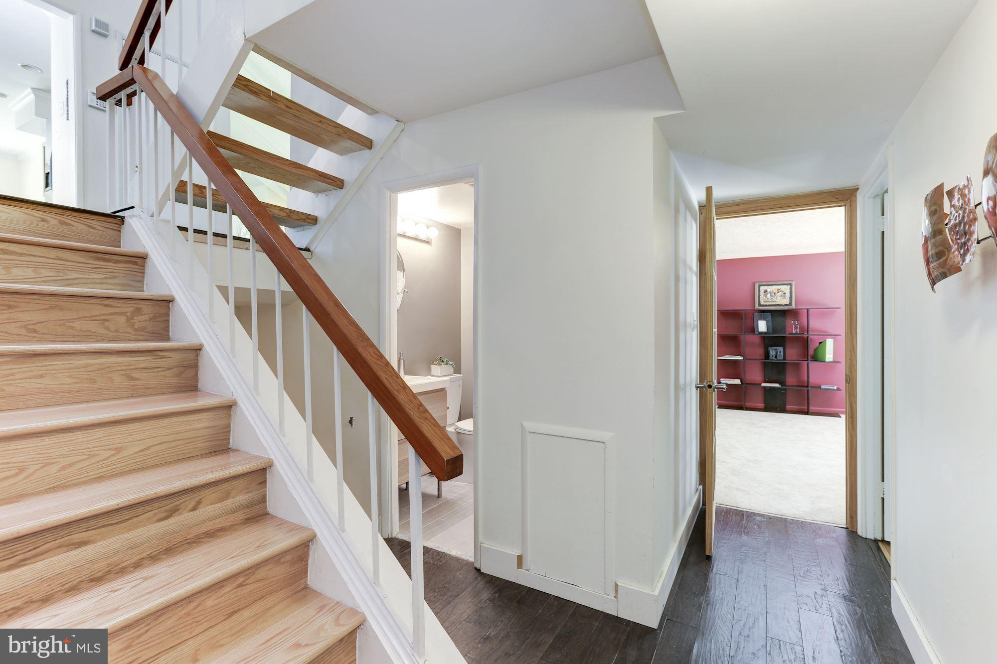 2415 Freetown Drive Reston, VA 20191 - Photo 25 of 38 Stairway Down to First Lower Level