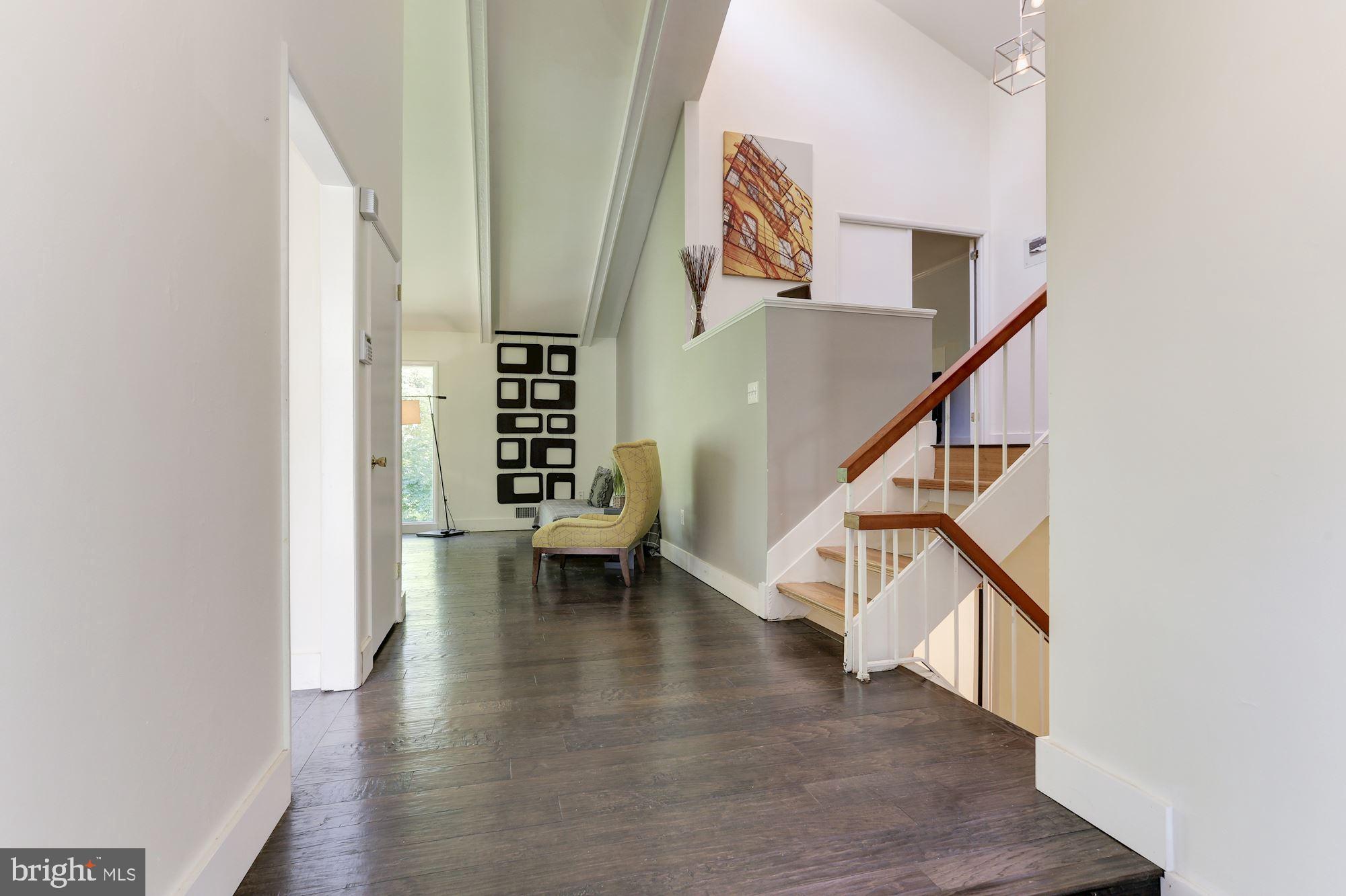 2415 Freetown Drive Reston, VA 20191 - Photo 4 of 38 Hardwood Floors Throughout Main and Upper Levels