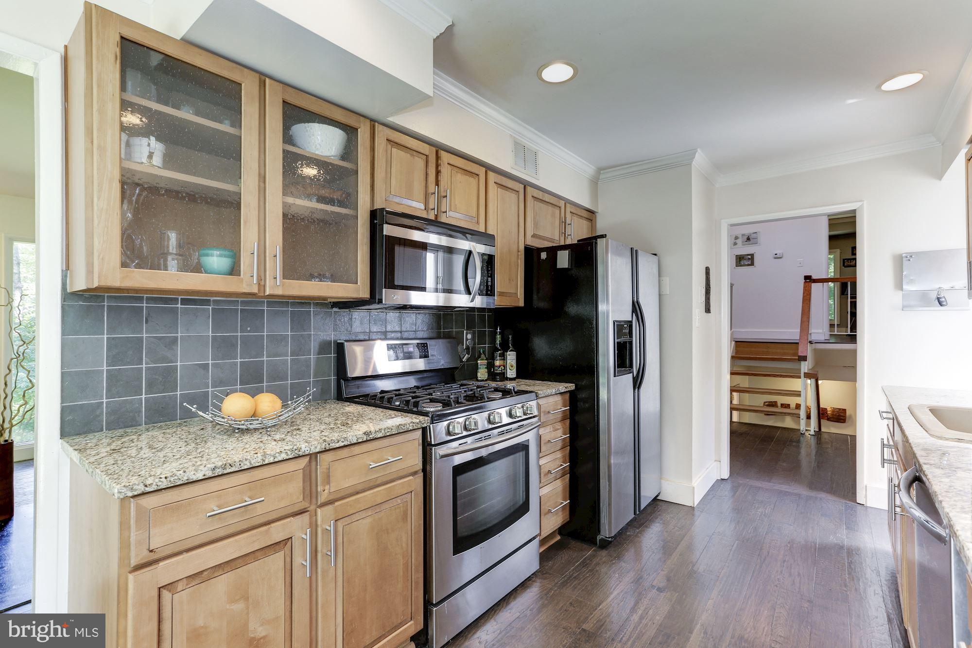 2415 Freetown Drive Reston, VA 20191 - Photo 9 of 38 Glass Front Cabinets for Special Dishes