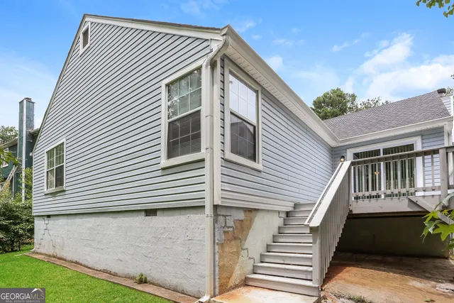 a front view of a house with a garage